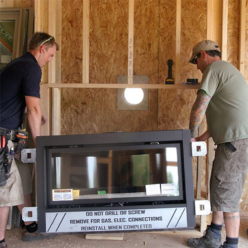 Technicians Installing Fireplace